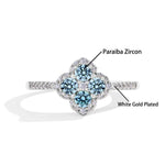 # Blumenring mit blauen Moissanitsteinen aus 925er Sterlingsilber für Damen - Eleganter, handgefertigter Schmuck